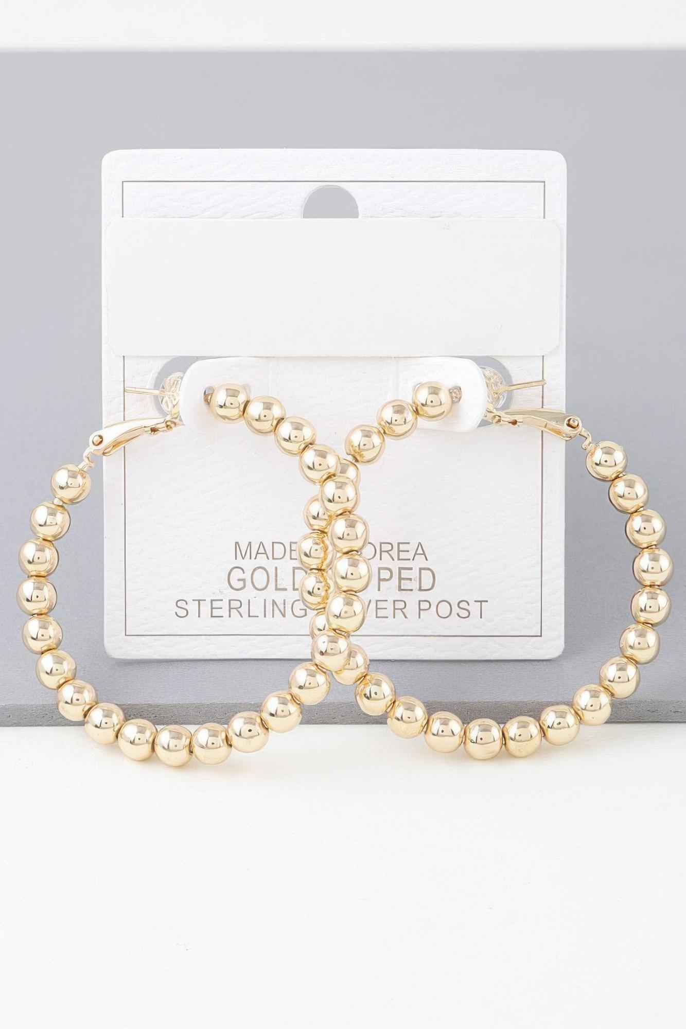 Shiny beaded hoop earrings image