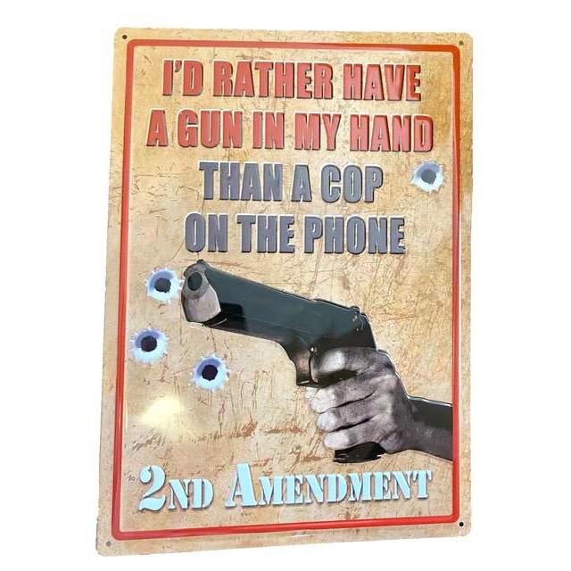 Pistol & Bullet Holes Retro Tin Signs image